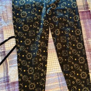 Universal Studios. Harry Potter Black Leggings with Gold Celestial Print